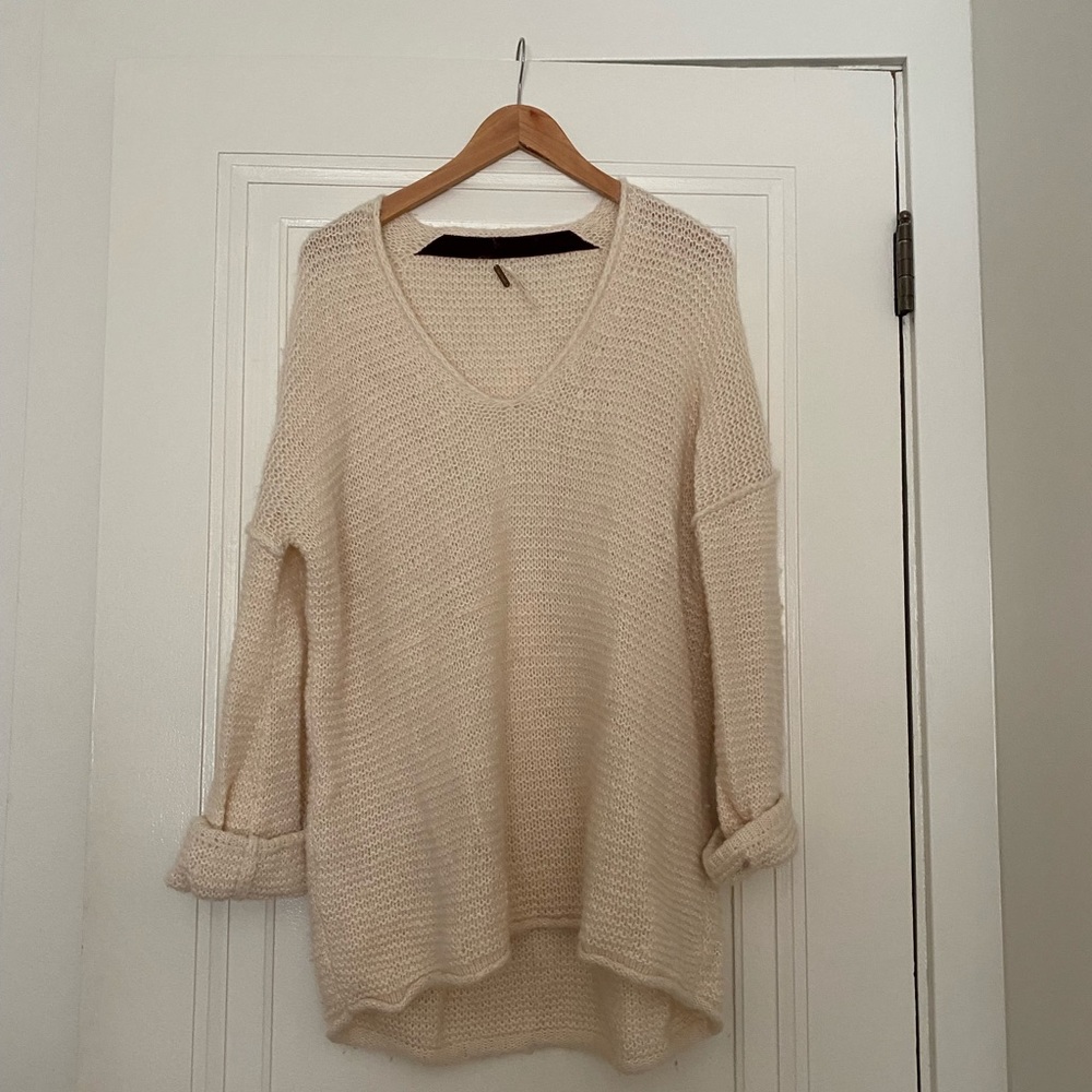 Free People cream knit sweater.